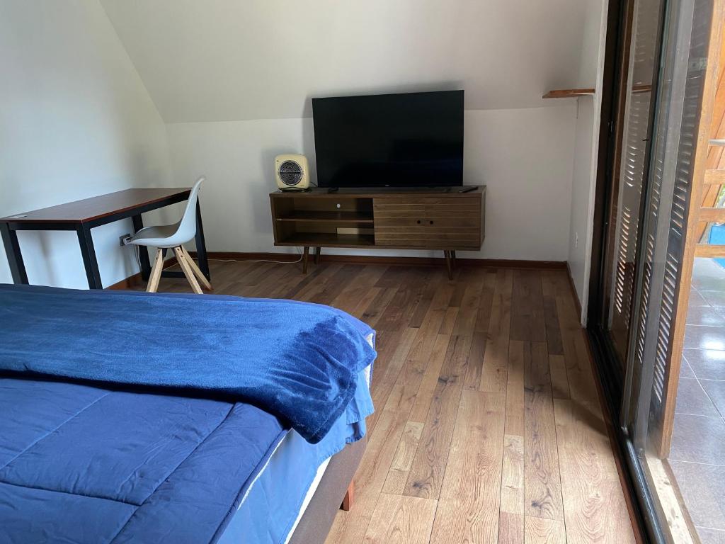 TV a/nebo společenská místnost v ubytování MAKTVB Costanera - Hostal Boutique