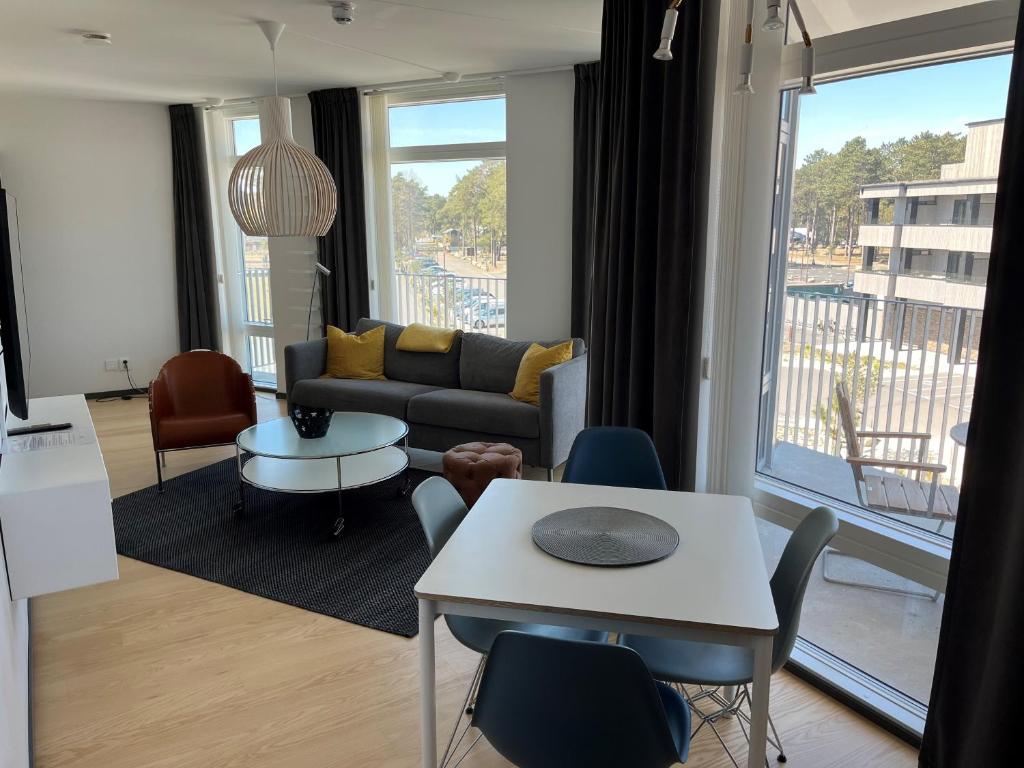 Posezení v ubytování ÅhusBrygga Apartment Hotel