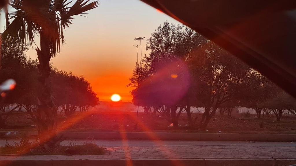 O nascer ou o pôr do sol visto a partir do apartamento