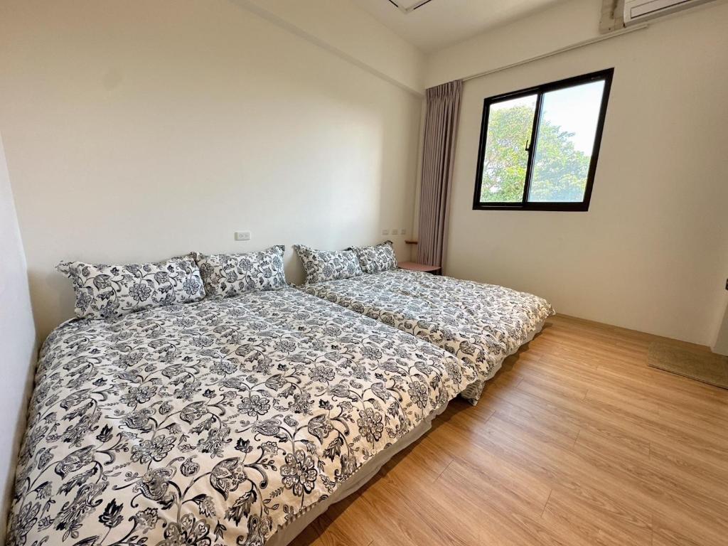 Postel nebo postele na pokoji v ubytování 9 Tan Yuan Homestay