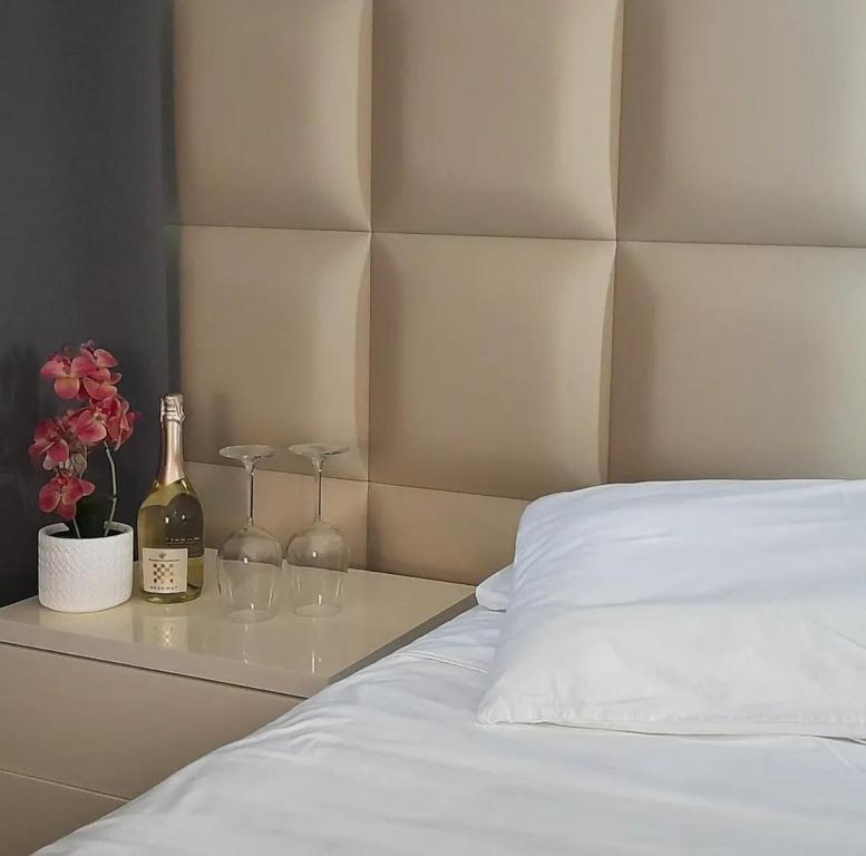 Postel nebo postele na pokoji v ubytování Hotel Noventa