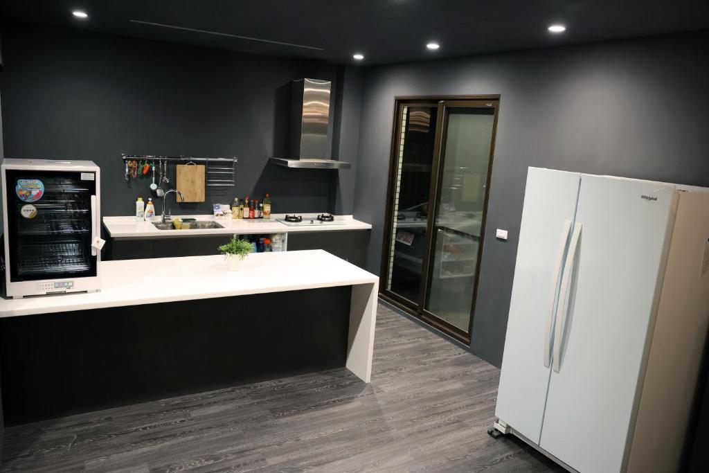 Kuchyň nebo kuchyňský kout v ubytování 9 Tan Yuan Homestay