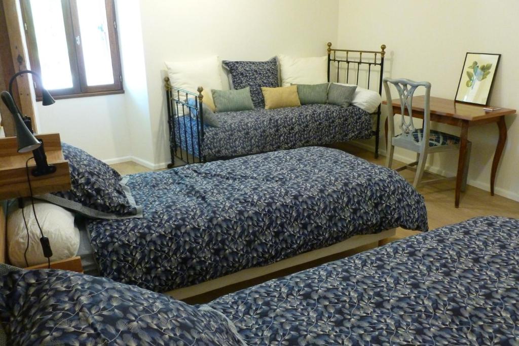 Posteľ alebo postele v izbe v ubytovaní Pechingorp Chambres d'hôtes