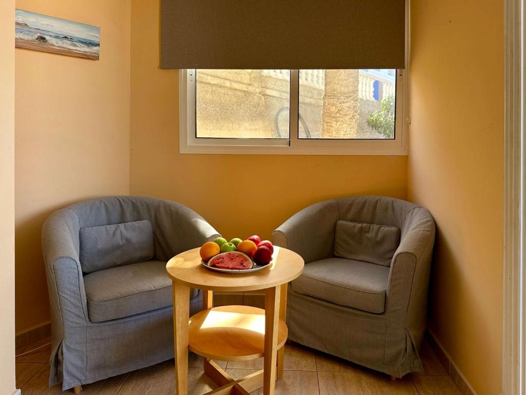 Posedenie v ubytovaní 1 Schlafzimmer Ferienwohnung am Strand