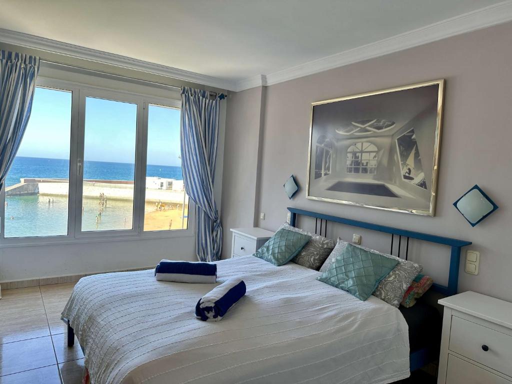Posteľ alebo postele v izbe v ubytovaní 1 Schlafzimmer Ferienwohnung am Strand