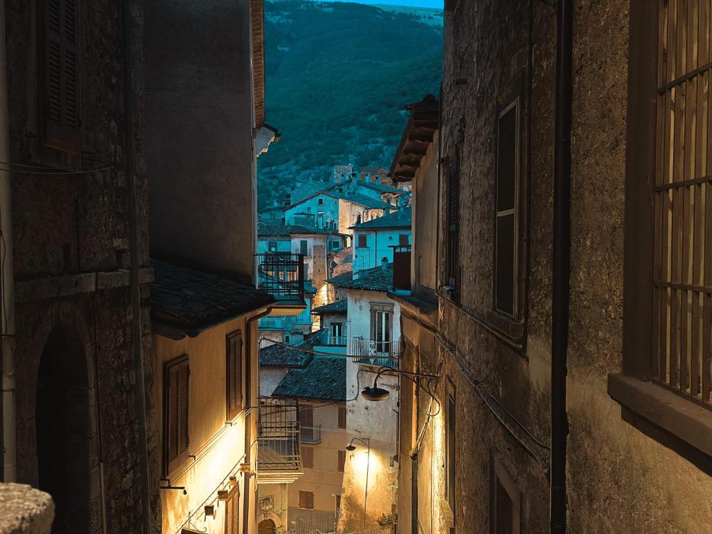 an alley in an old town at night at House Scanno centro storico in Scanno