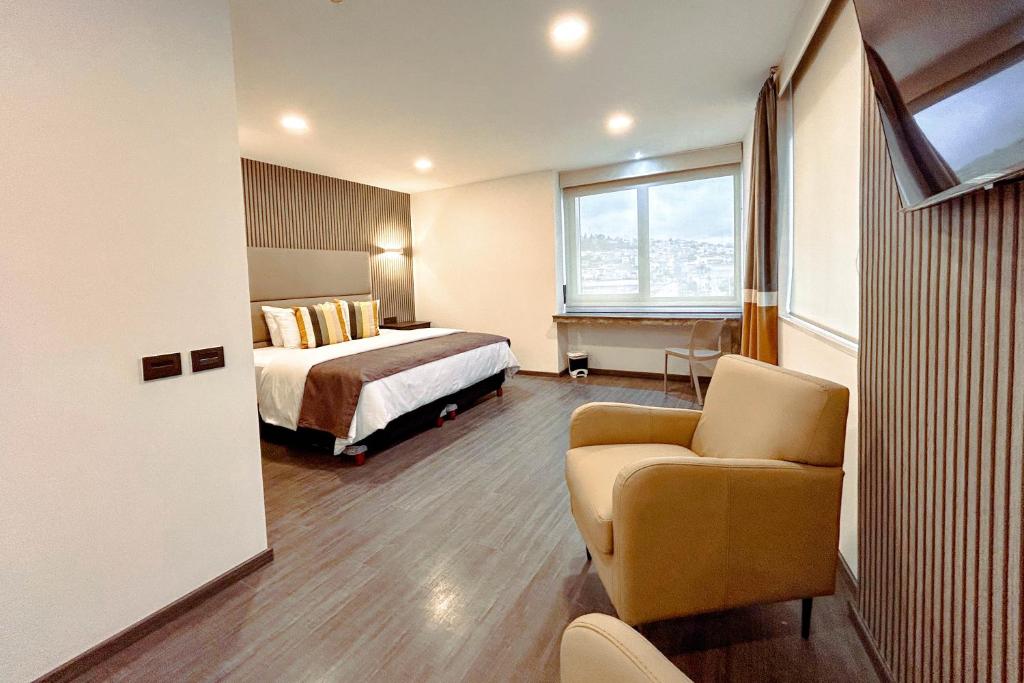 Postel nebo postele na pokoji v ubytování HUNICO HOTEL