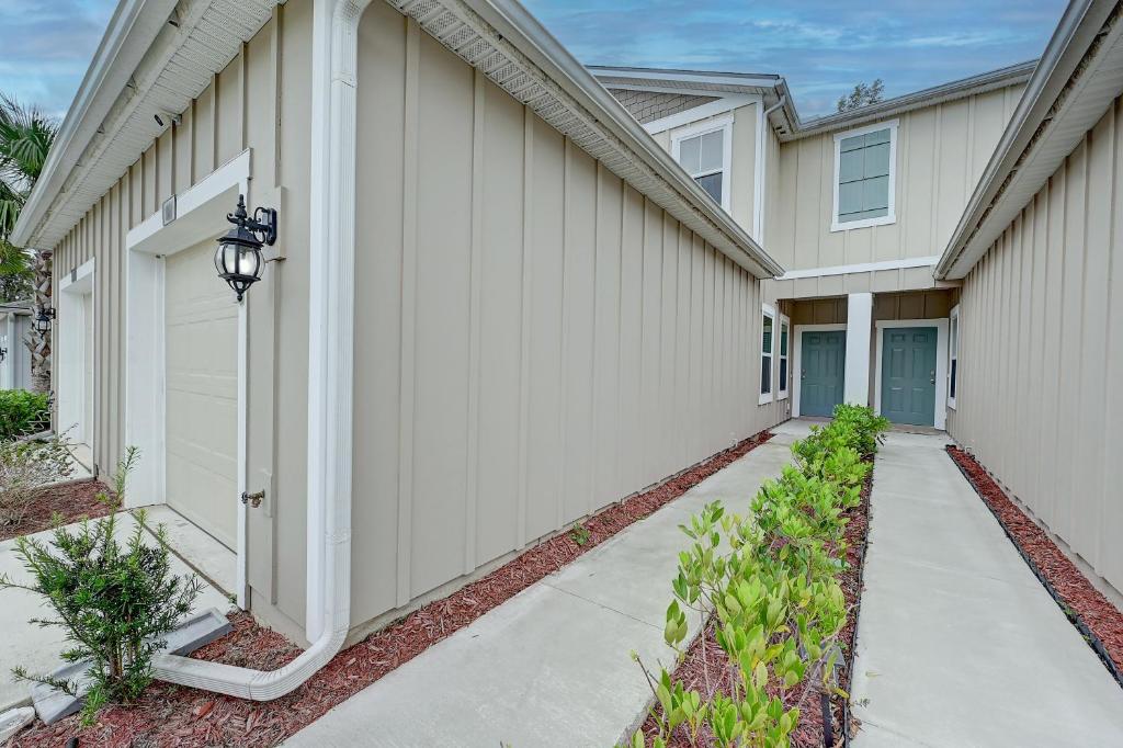 a walkway in front of a house at Rental Destination Relaxation I in Jacksonville