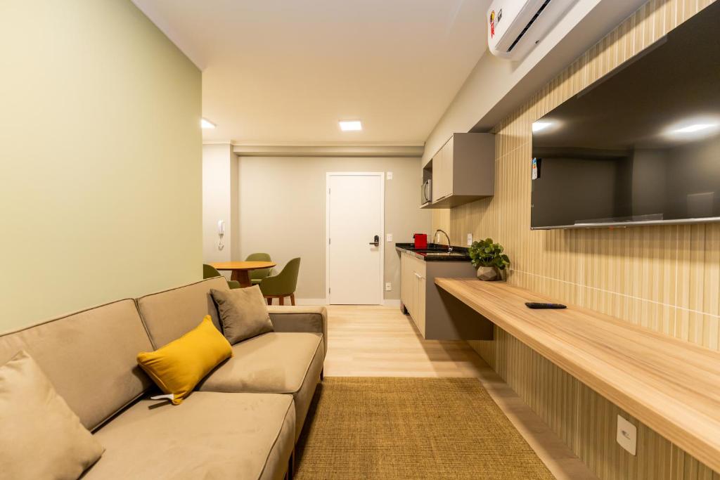 TV a/nebo společenská místnost v ubytování Apartamentos Studio Allure Moema - Com café da manhã opcional, Recepção e Valet 24 horas
