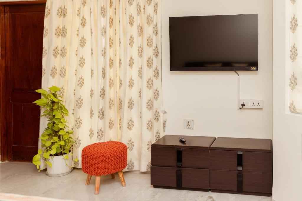 TV a/nebo společenská místnost v ubytování Luho 41 Penthouse