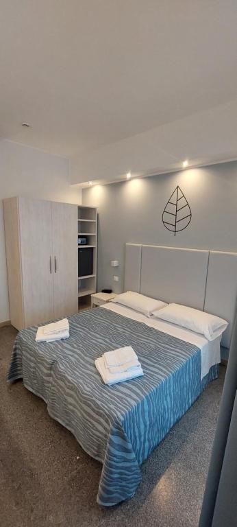 Postel nebo postele na pokoji v ubytování Hotel Caravel Park