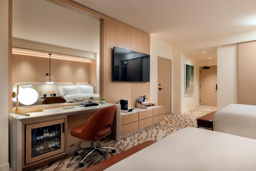 Ein Bett oder Betten in einem Zimmer der Unterkunft Durango Casino &amp; Resort