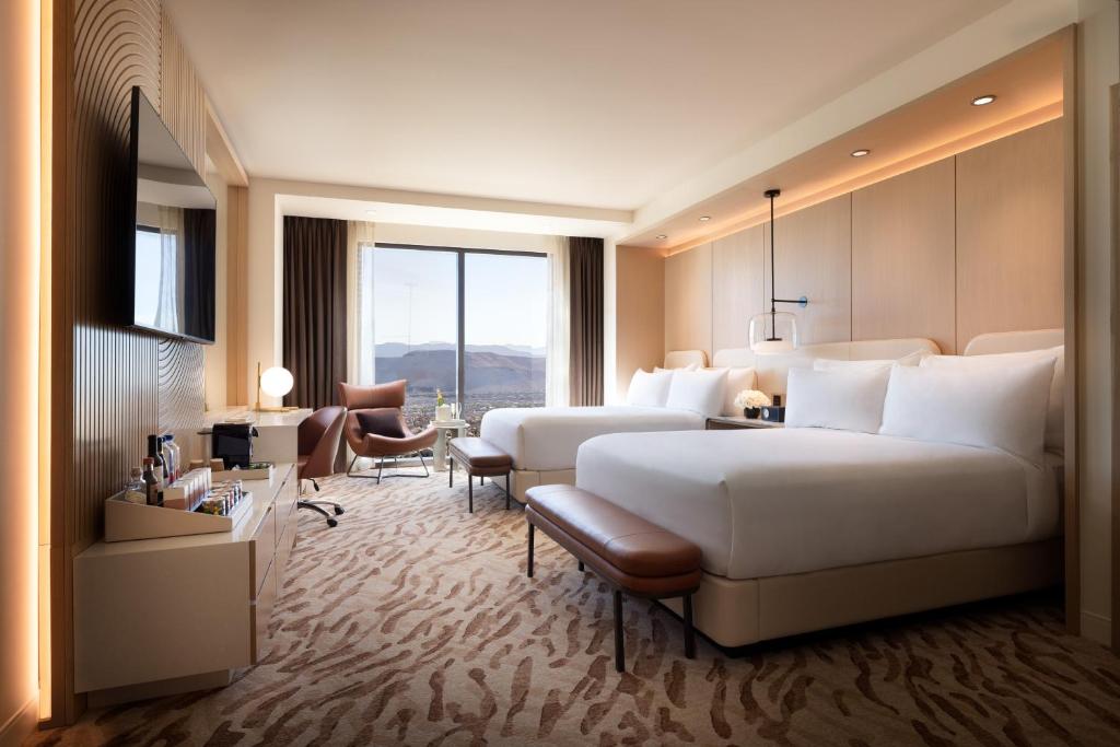 Ein Bett oder Betten in einem Zimmer der Unterkunft Durango Casino &amp; Resort
