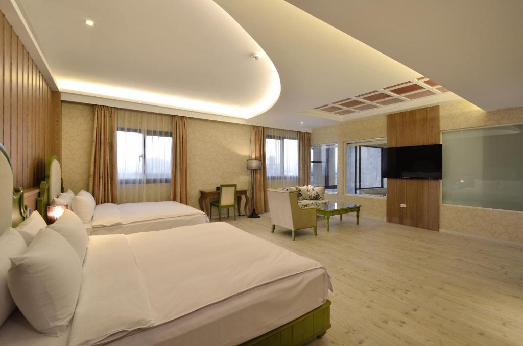 Postel nebo postele na pokoji v ubytování Zhaody Hotel