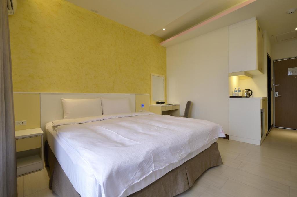 Postel nebo postele na pokoji v ubytování Zhaody Hotel