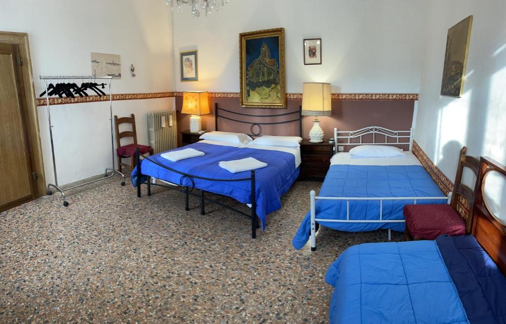 Кровать или кровати в номере Princess Guest House Canal View