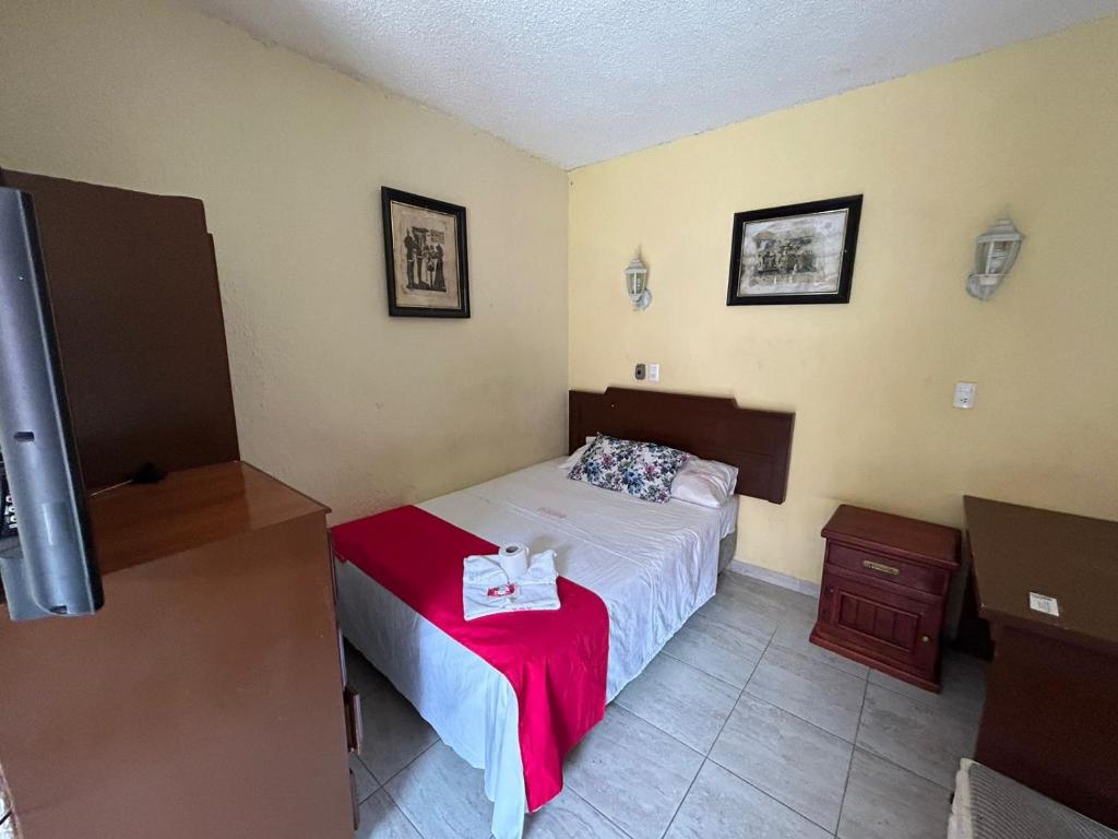 Postel nebo postele na pokoji v ubytování Hotel Capri Playa a una calle de la Playa Regatas