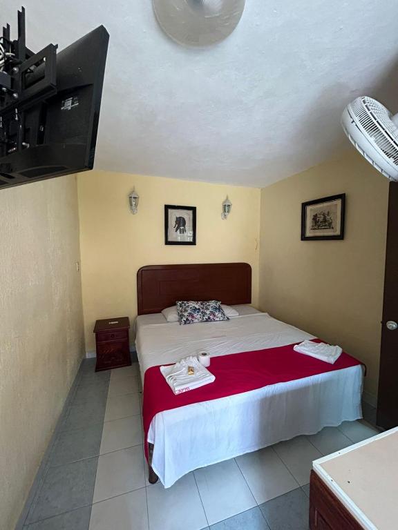 Postel nebo postele na pokoji v ubytování Hotel Capri Playa a una calle de la Playa Regatas