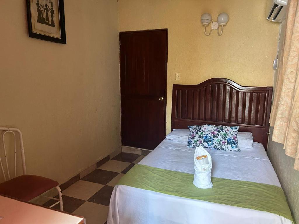 Postel nebo postele na pokoji v ubytování Hotel Capri Playa a una calle de la Playa Regatas