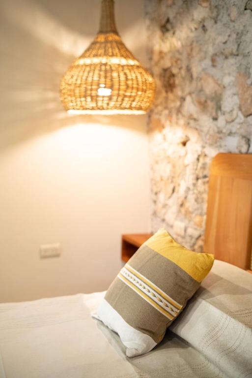 Postel nebo postele na pokoji v ubytování Casa Cactus Buenavista