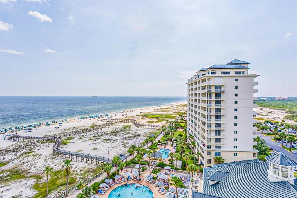 an aerial view of a hotel and the beach at The Beach Club Resort and Spa III in Gulf Shores