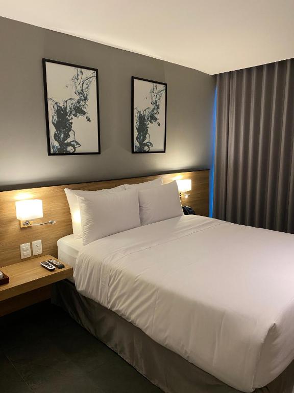Postel nebo postele na pokoji v ubytování B's Suites Mérida