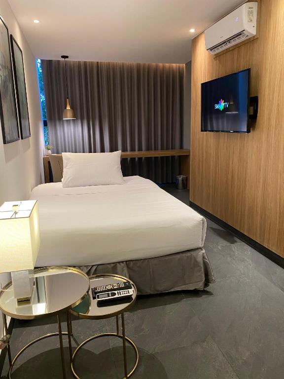 Postel nebo postele na pokoji v ubytování B's Suites Mérida