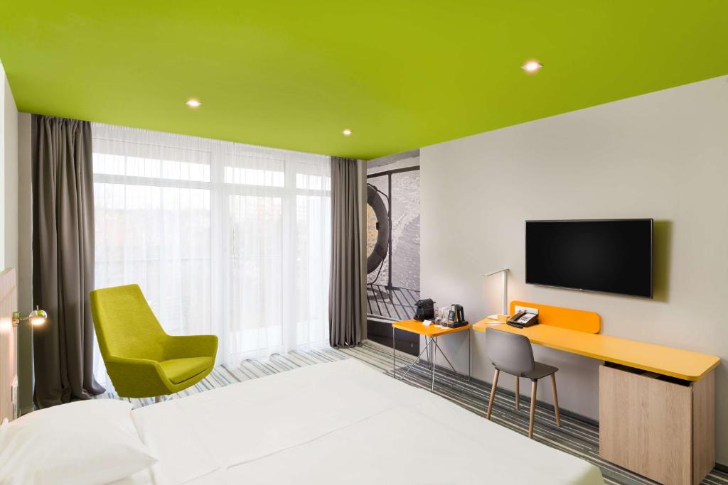 TV a/nebo společenská místnost v ubytování Park Inn By Radisson Zalakaros Hotel & Spa