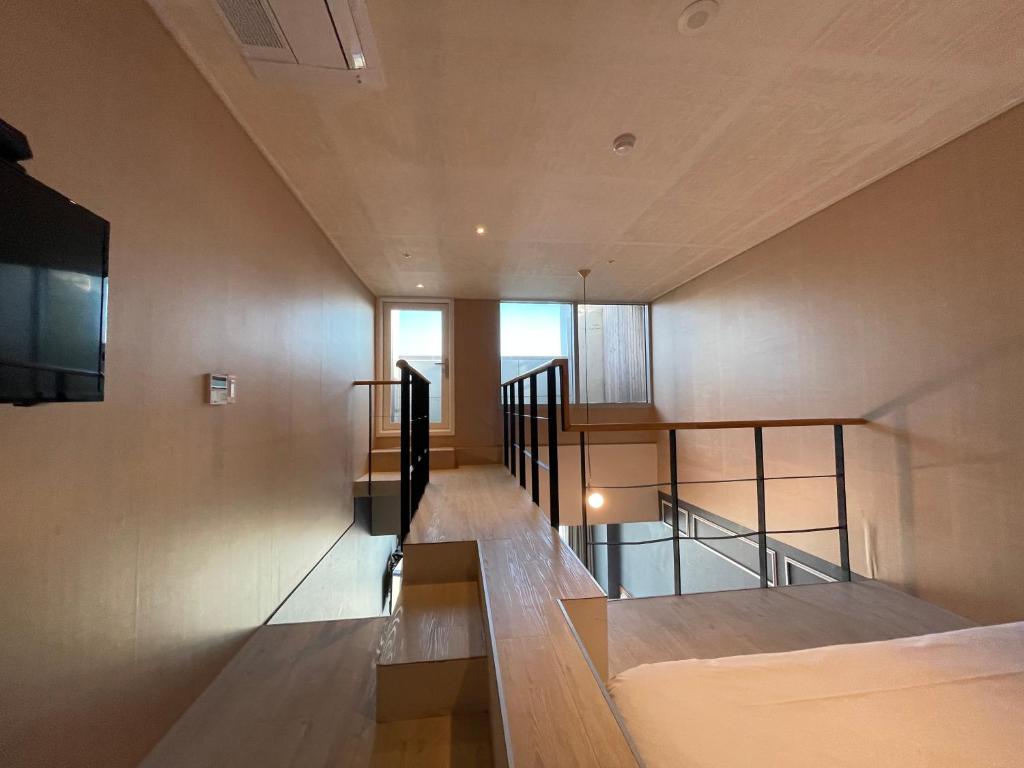 Postel nebo postele na pokoji v ubytování Elysia Boutique Hotel