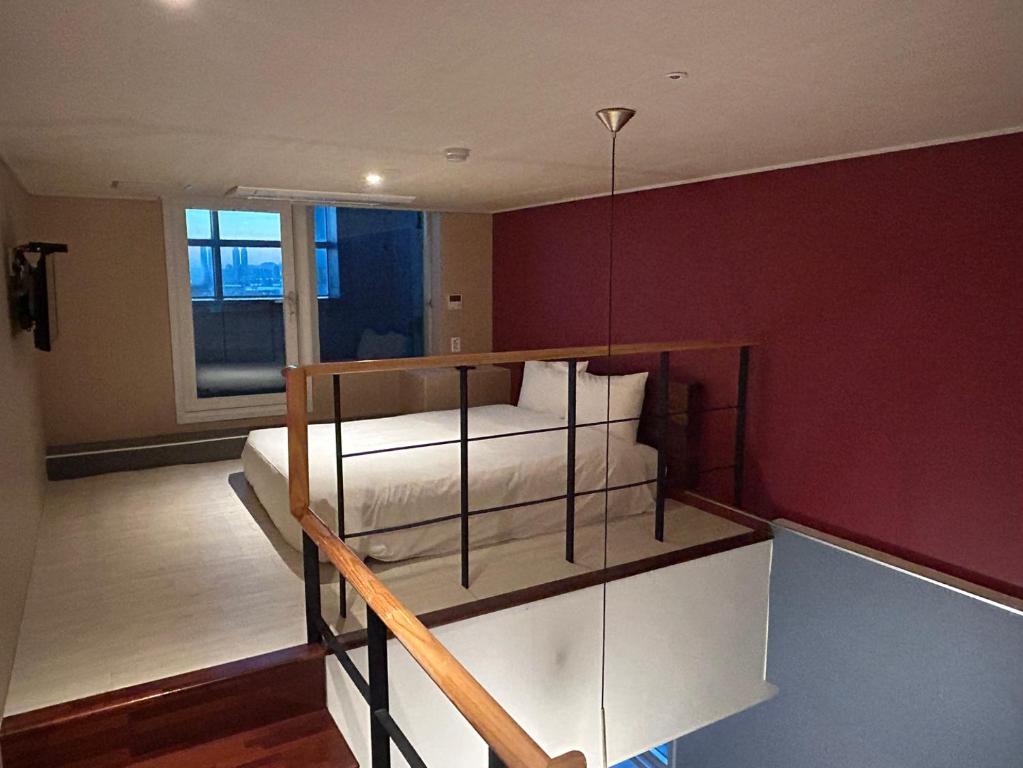 Postel nebo postele na pokoji v ubytování Elysia Boutique Hotel