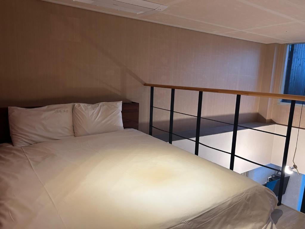 Postel nebo postele na pokoji v ubytování Elysia Boutique Hotel