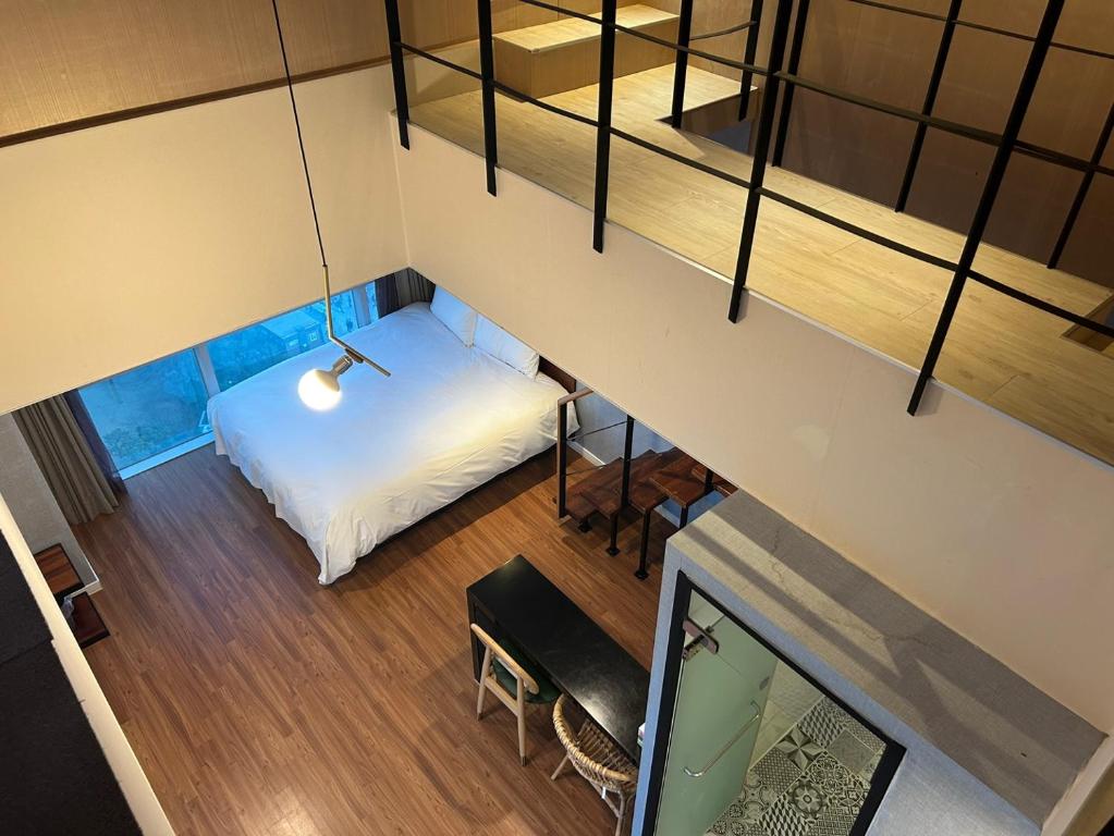 Postel nebo postele na pokoji v ubytování Elysia Boutique Hotel