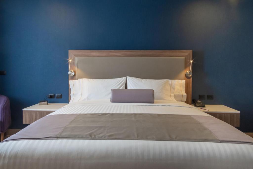 Postel nebo postele na pokoji v ubytování Sheraton Guadalajara Expo