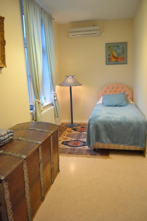 Postel nebo postele na pokoji v ubytování Varmland Hotel