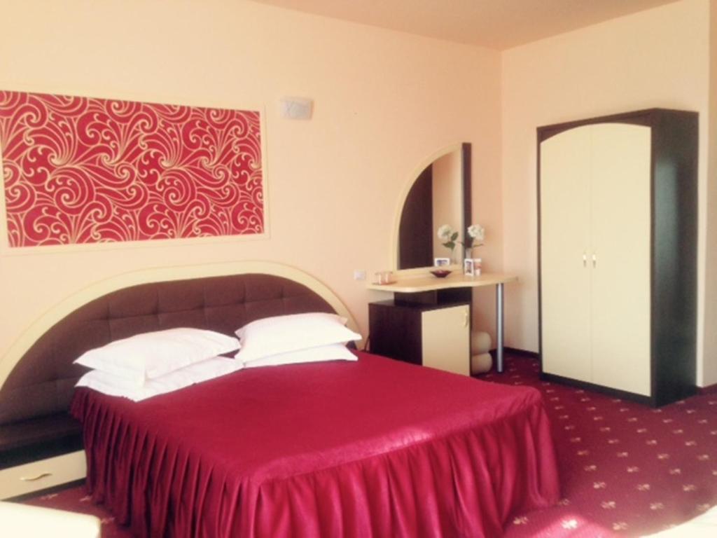 Postel nebo postele na pokoji v ubytování Hotel Kleyn