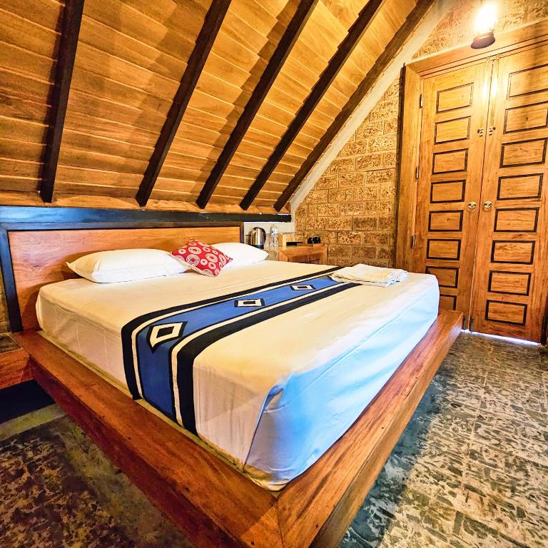 Postel nebo postele na pokoji v ubytování Yamu Lanka Inn