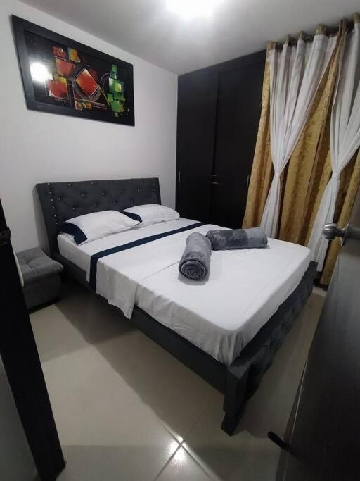 Postel nebo postele na pokoji v ubytování Casa Familiar