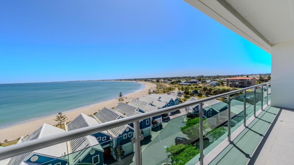 a view of the beach from the balcony of a condo at Sea Side 508 in Mandurah
