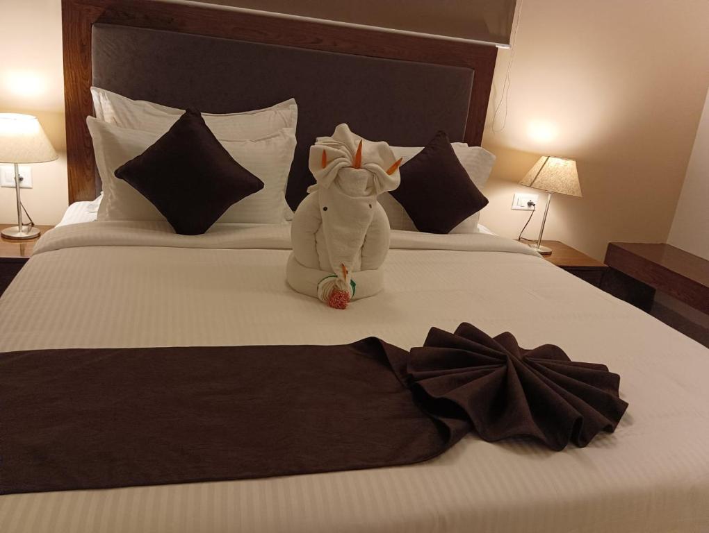 Postel nebo postele na pokoji v ubytování Le MIAMI RESORT