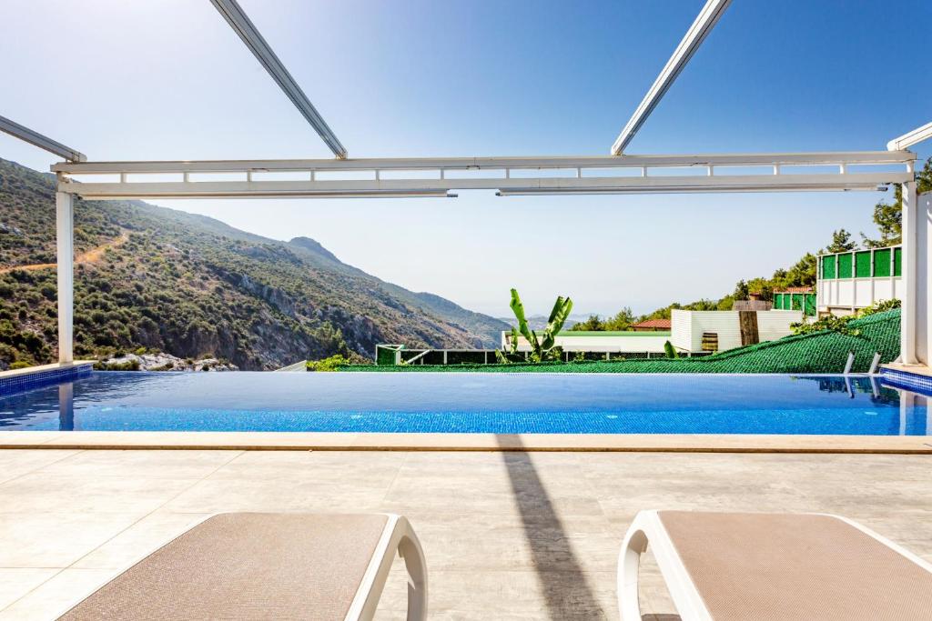Bazén v ubytování infinity paradise nebo v jeho okolí