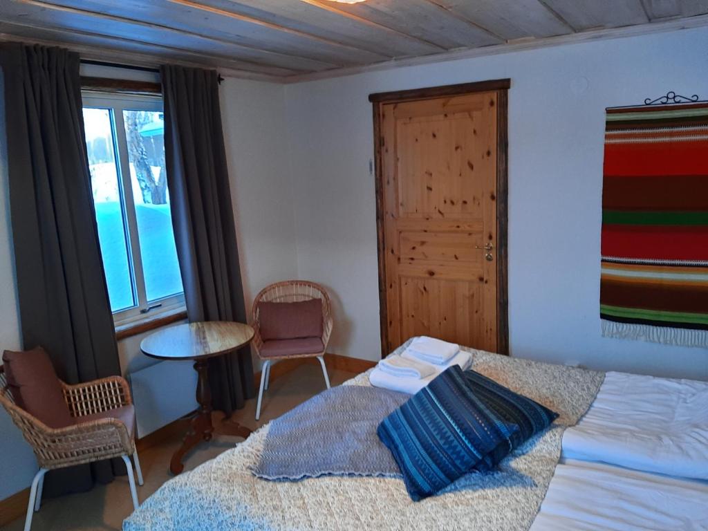 Postel nebo postele na pokoji v ubytování Kalix Riverside inn