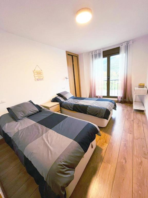 Postel nebo postele na pokoji v ubytování Dúplex El refugio de Porma