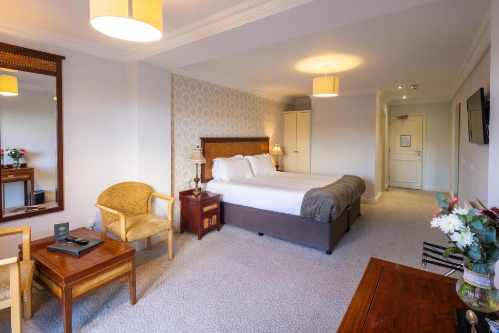 Ένα ή περισσότερα κρεβάτια σε δωμάτιο στο West Cork Hotel