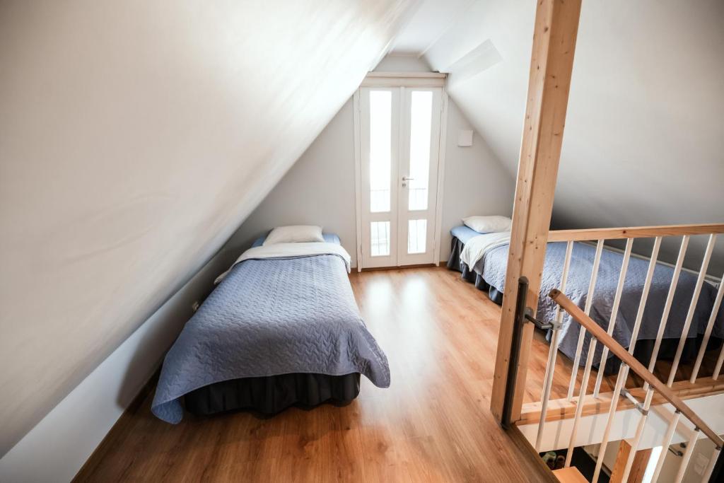 Postel nebo postele na pokoji v ubytování Cabin Guesthouse with free parking
