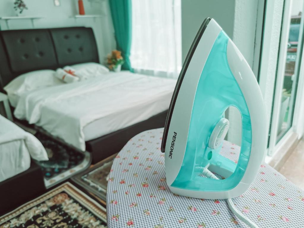 Postel nebo postele na pokoji v ubytování Inap Idaman 5 With 2 Queen Bed In Kubang Kerian