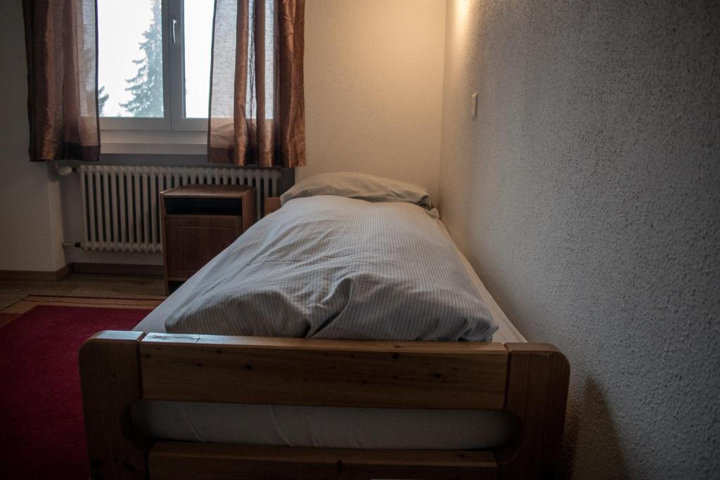 Postel nebo postele na pokoji v ubytování Hotel Malixerhof