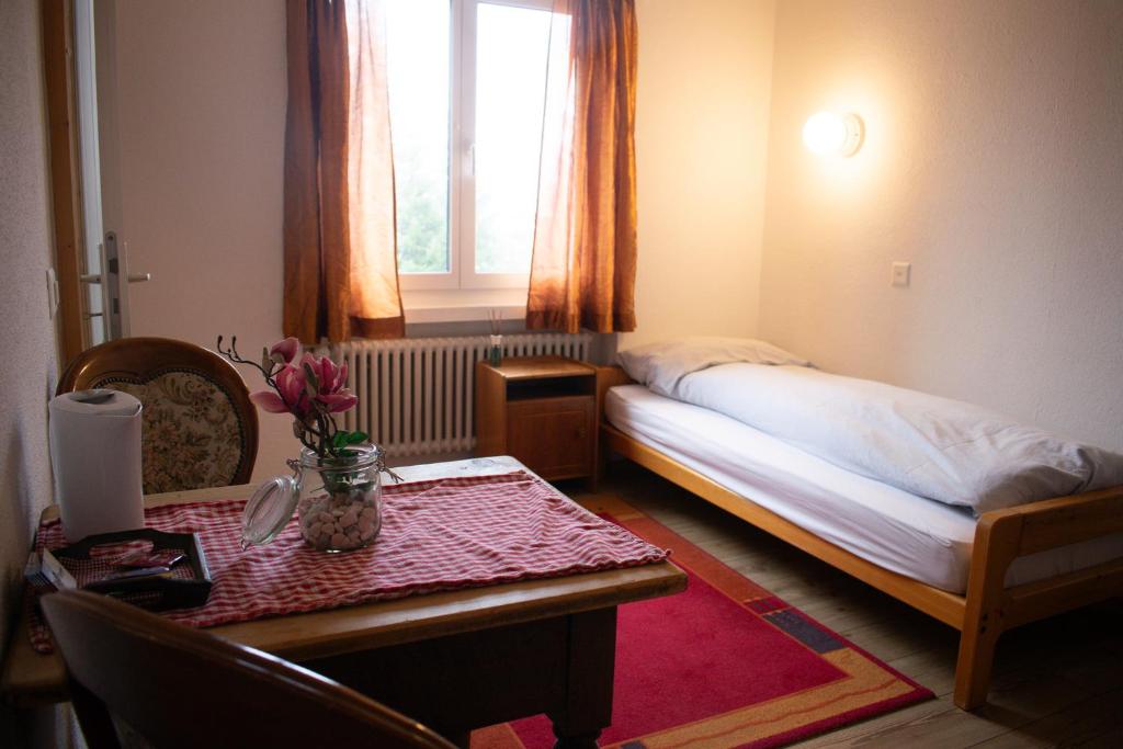 Postel nebo postele na pokoji v ubytování Hotel Malixerhof