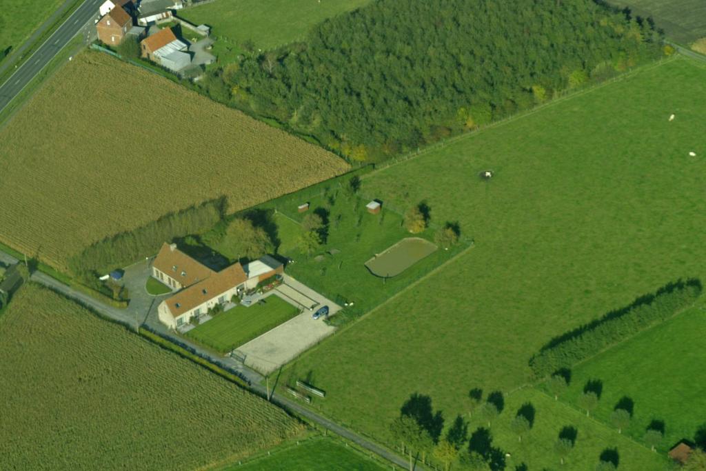 an aerial view of a house in a field at Apollonia in Aalter