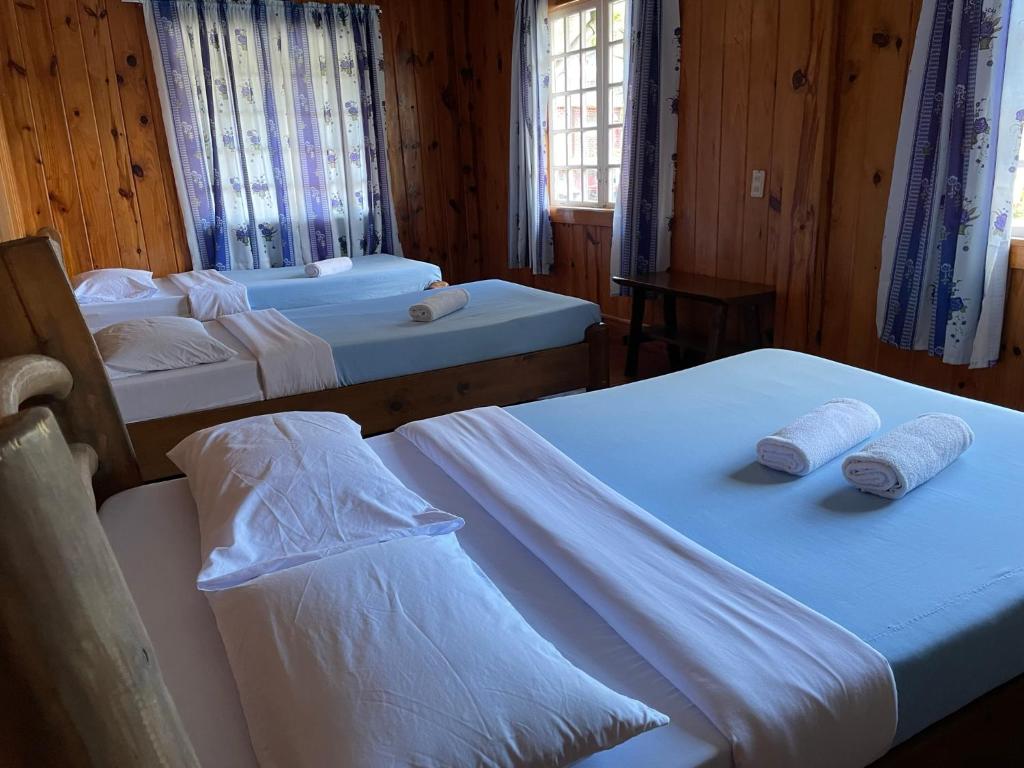 Postel nebo postele na pokoji v ubytování Saint Joseph Inn