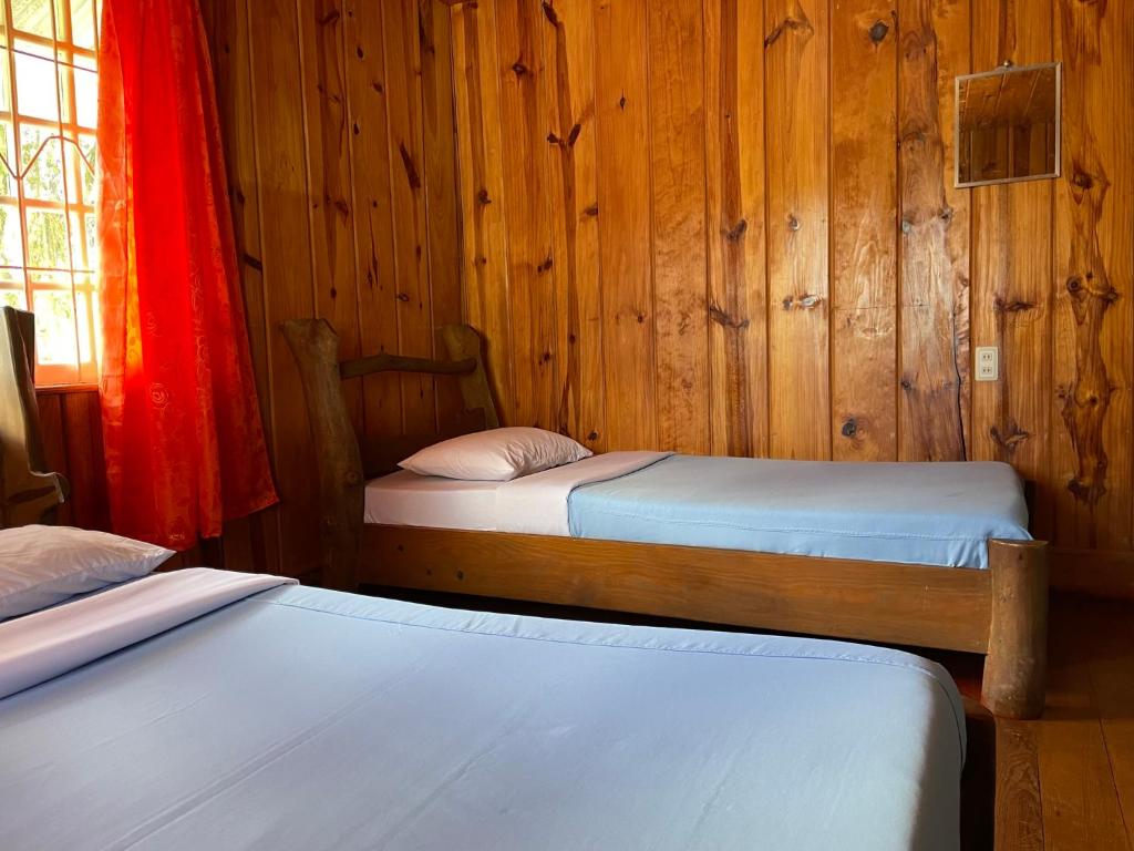 Postel nebo postele na pokoji v ubytování Saint Joseph Inn